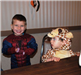 Young Spiderman and Giraffe Smile Together