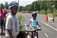 Children Pose for Camera In Preparation for Bike Course