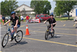 Children Ride Next to Each Other on Course