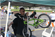 Officer and Volunteers Look at Bikes