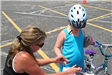 Resident Talks With Young Bike Rider
