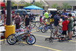 Young Bikers Line Up Bikes Near Tents