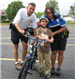 Police Officials Stand With Young Rider for Picture