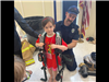 Safety Town Kids Trying On Fire Gear