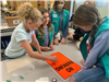 CMS Girl Scouts working on Badge