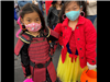 Two little girls in costumes