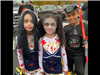 Three kids in costumes