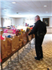 Officer Looks Over Items on Table