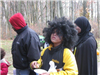 Boy in Steelers Jacket and Wig Enjoys Snacks