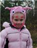 Child in Pink Costume and Face Paint