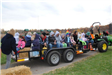 Participants Riding on Hay Bale Ride