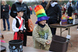 Young Boy in Rainbow Hat