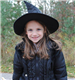 Young Child in Witch Costume