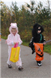 Young Costume Wearing Children with Candy Bags