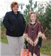 Young Girl in Costume With Mom