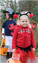 Young Girl in Lady Bug Costume
