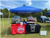 Vendor Set Up At His Table at Copley Community Park on Saturday For Heritage Days 2025