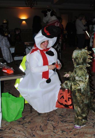 Volunteer Giving Out Candy in Costume
