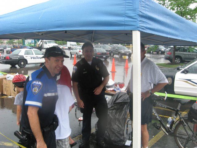 Officers Smiling Together as They Give Instructions