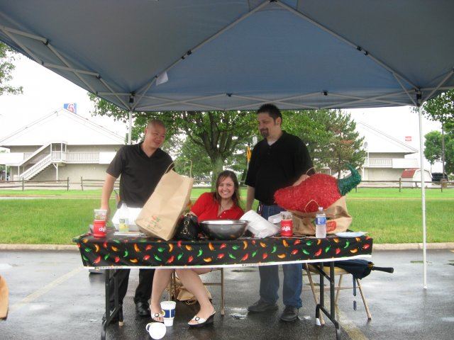 Volunteers From Chilis Pose For Camera