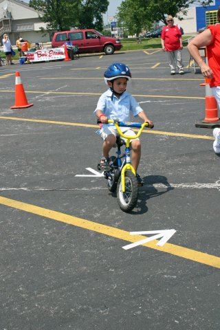 Young Child Focuses While Going Through Course