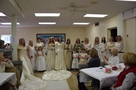 Girls in wedding dresses and flower girls