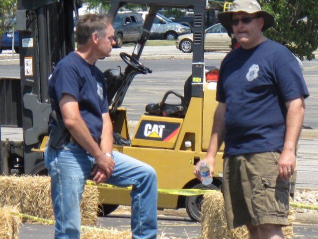 Volunteers Talk While Waiting