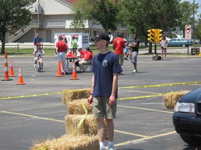 Young Volunteer Overlooks Course