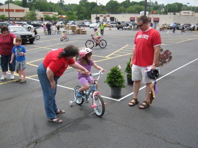 Volunteer Talks With Child Going Through Course