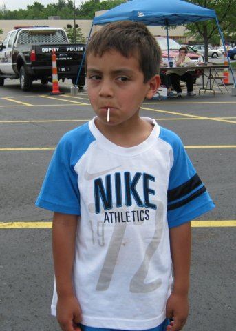 Young Rider Enjoys a Piece of Candy