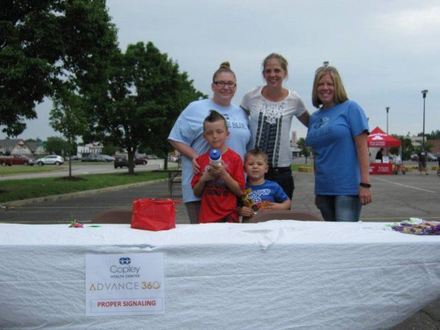Table Area with Riders and Volunteers
