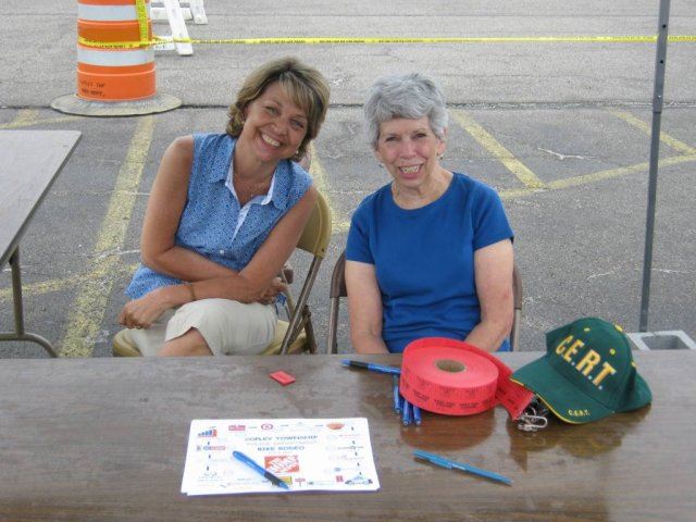 Volunteers Smile at Home Depot Tent