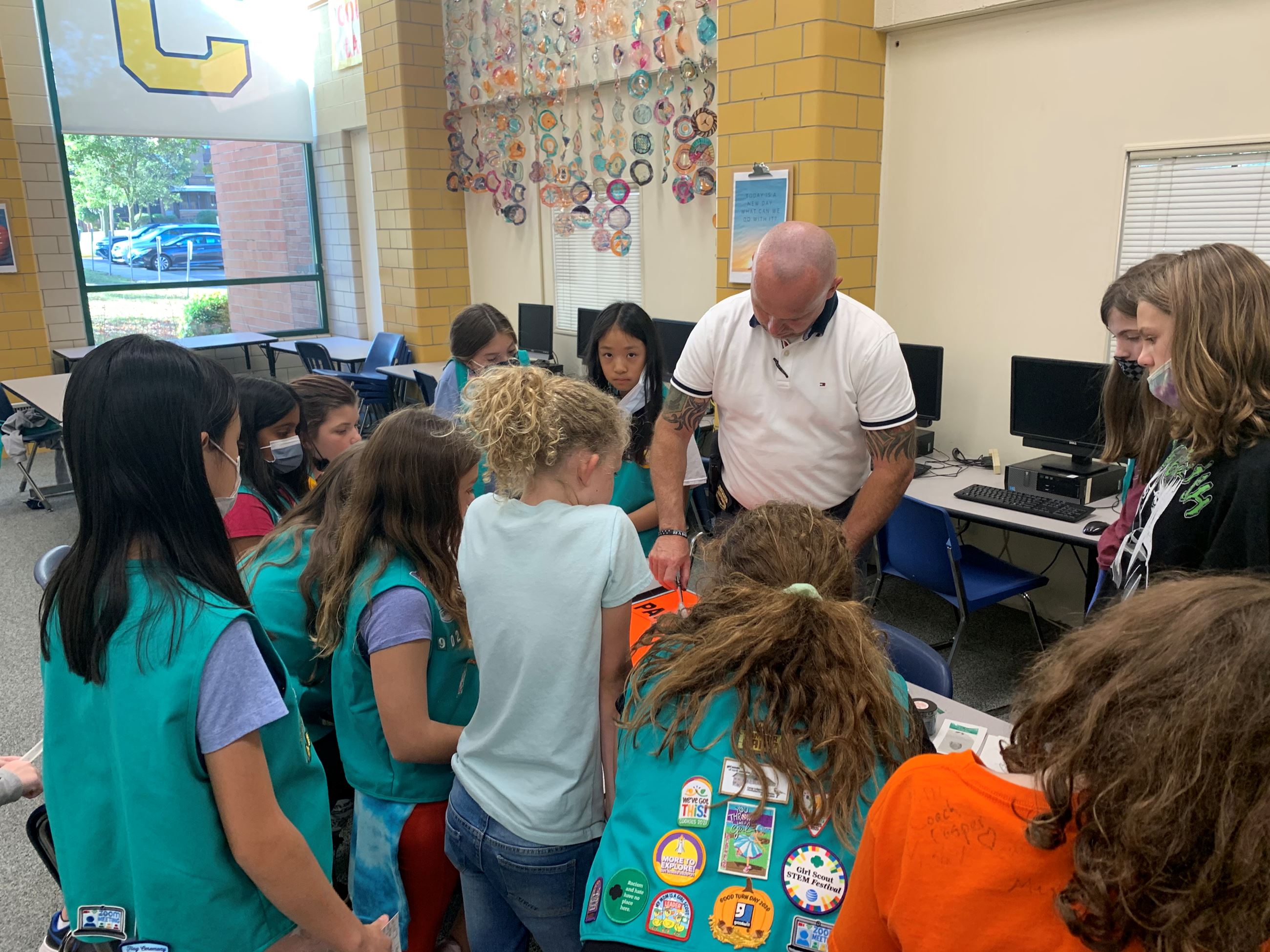 CMS Girl Scouts working on Badge