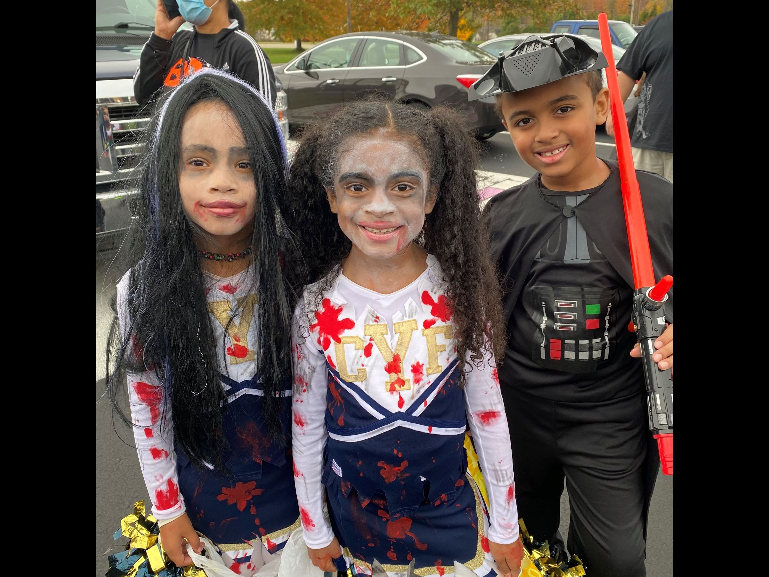 Three kids in costumes