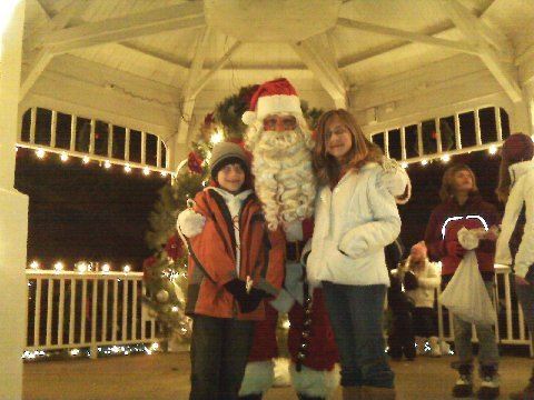Children Take a Photo With Santa