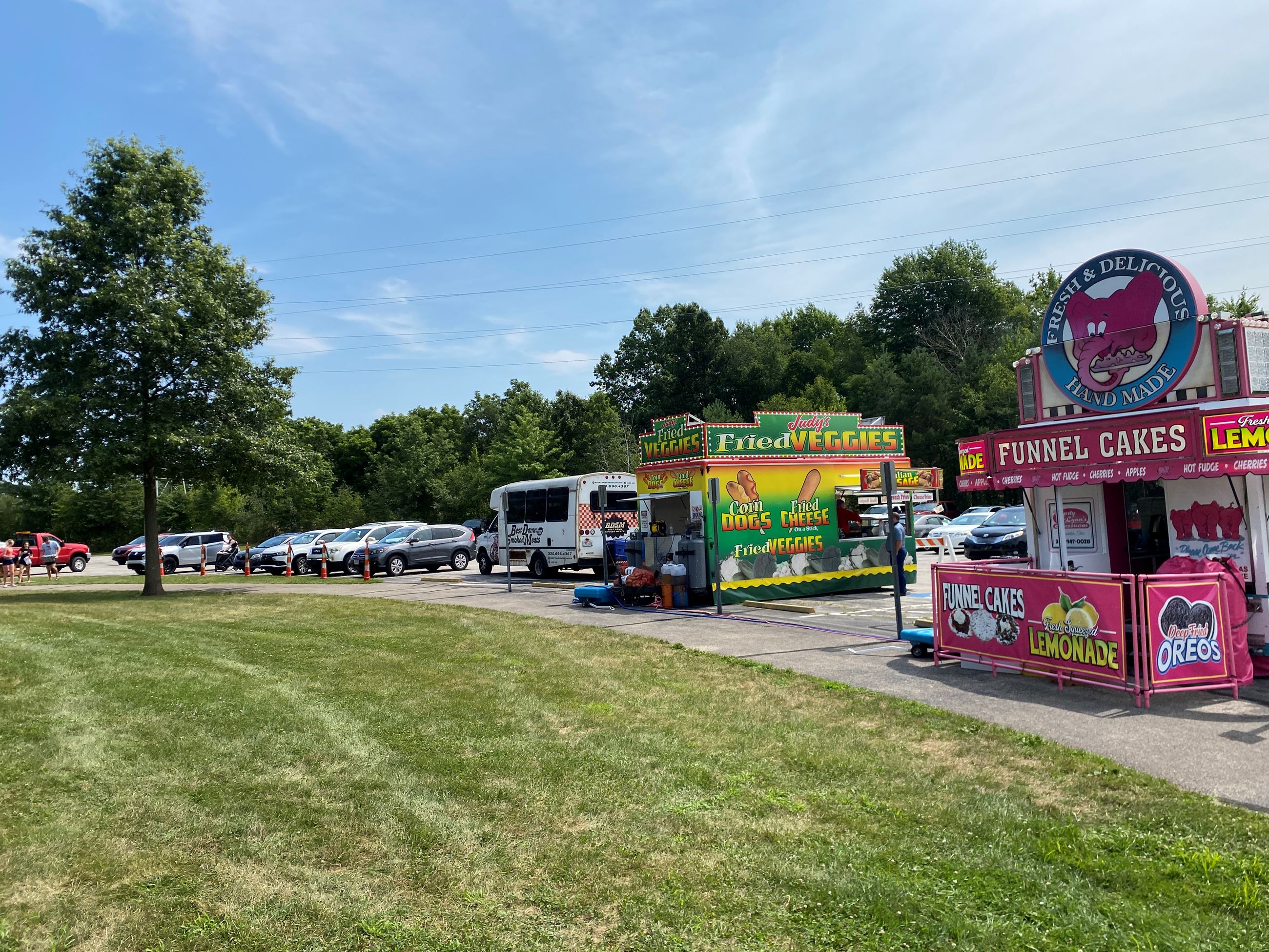 Food Truck Vendors Lined Up in the Parking Lot at Copley Community Park