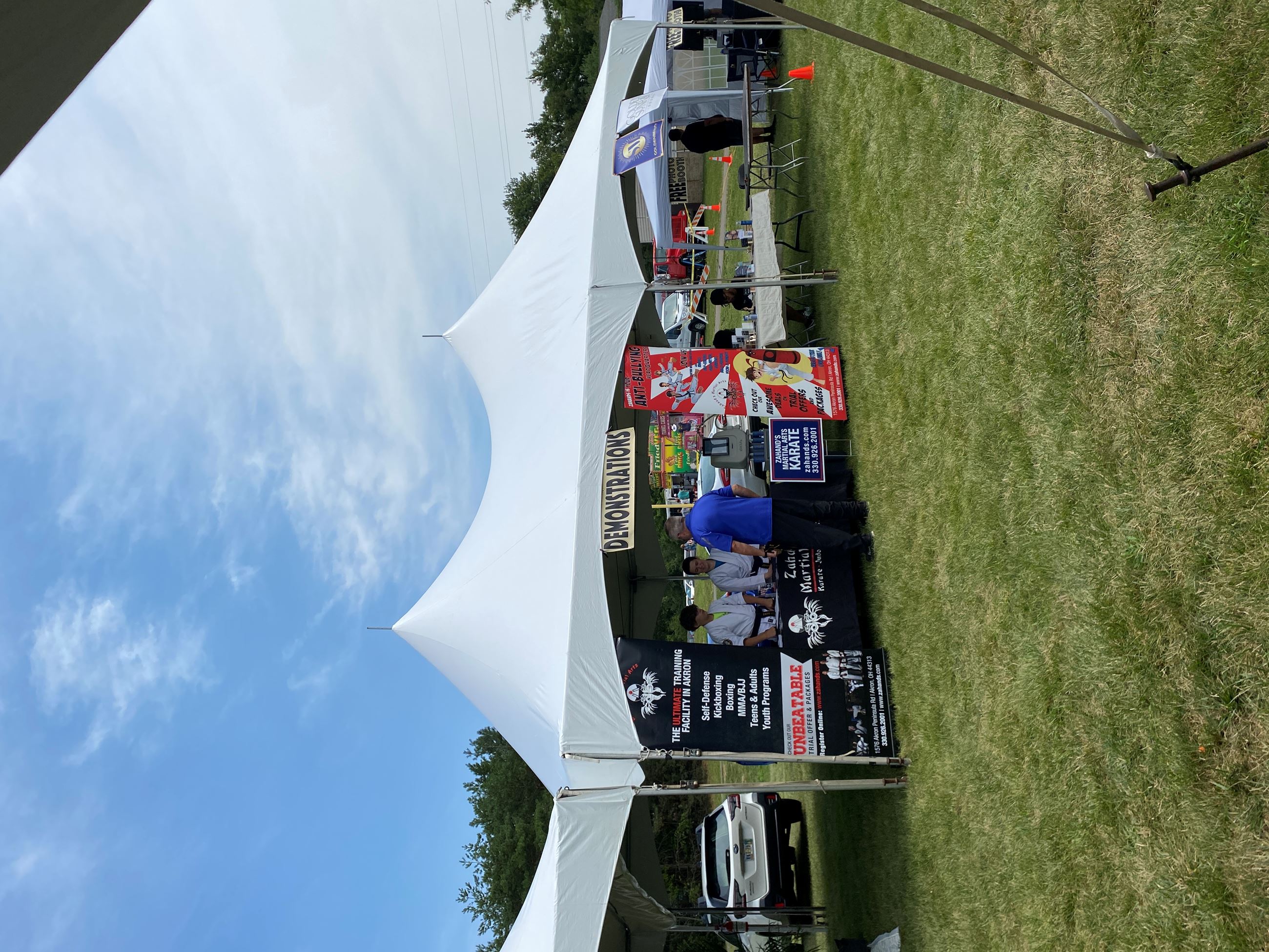 Vendors Set Up Under a White Tent At Copley Community Park on Saturday For Heritage Days 2025