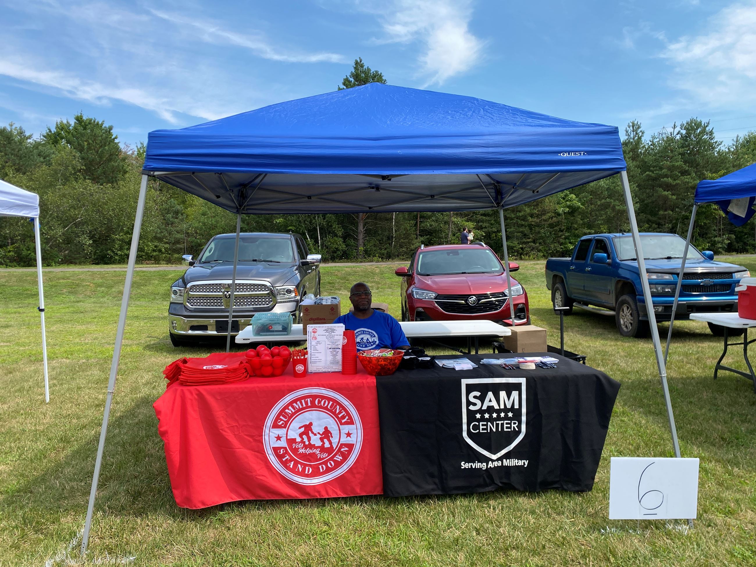 Vendor Set Up At His Table at Copley Community Park on Saturday For Heritage Days 2025
