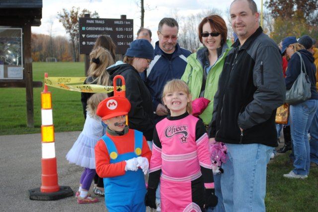 Young Children Smile While Waiting in Line